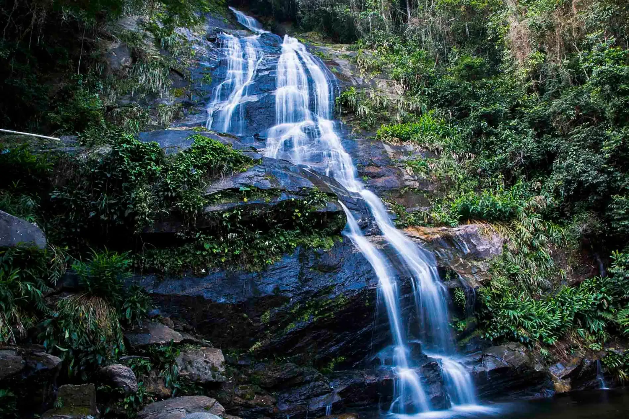 Stunning waterfall in lush rainforest